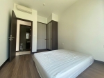 spacious 1 bedroom apartment for rent at empire city tilia with basic interior and functional layout